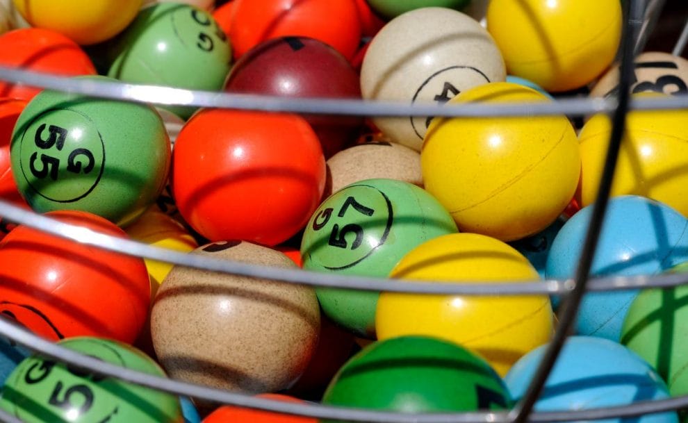 Colorful bingo balls in a bingo cage.