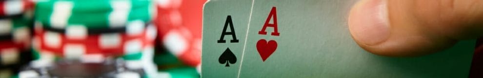 A pair of aces in someone’s hand.