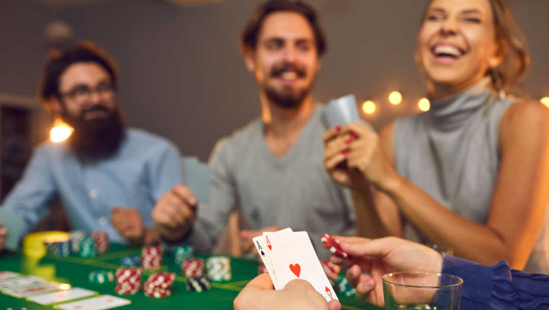 A group of friends playing a social poker game