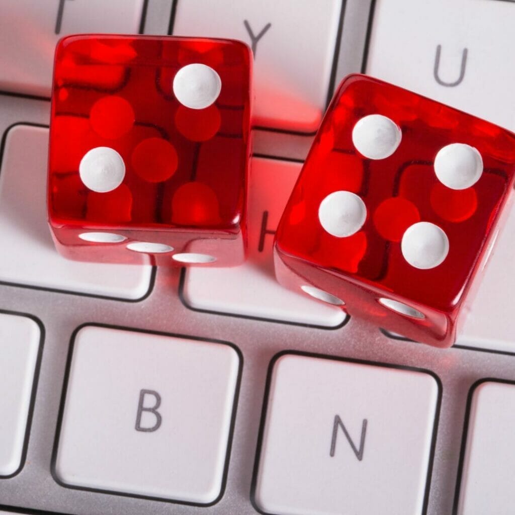 Header image, a pair of red dice on a keyboard