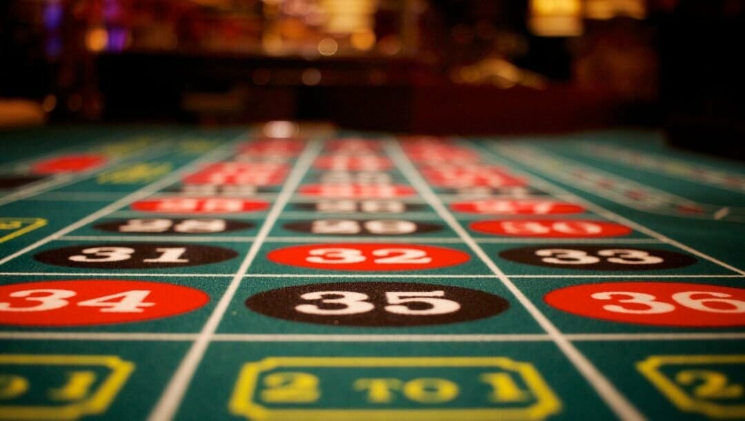 close-up of a roulette number table in a casino.