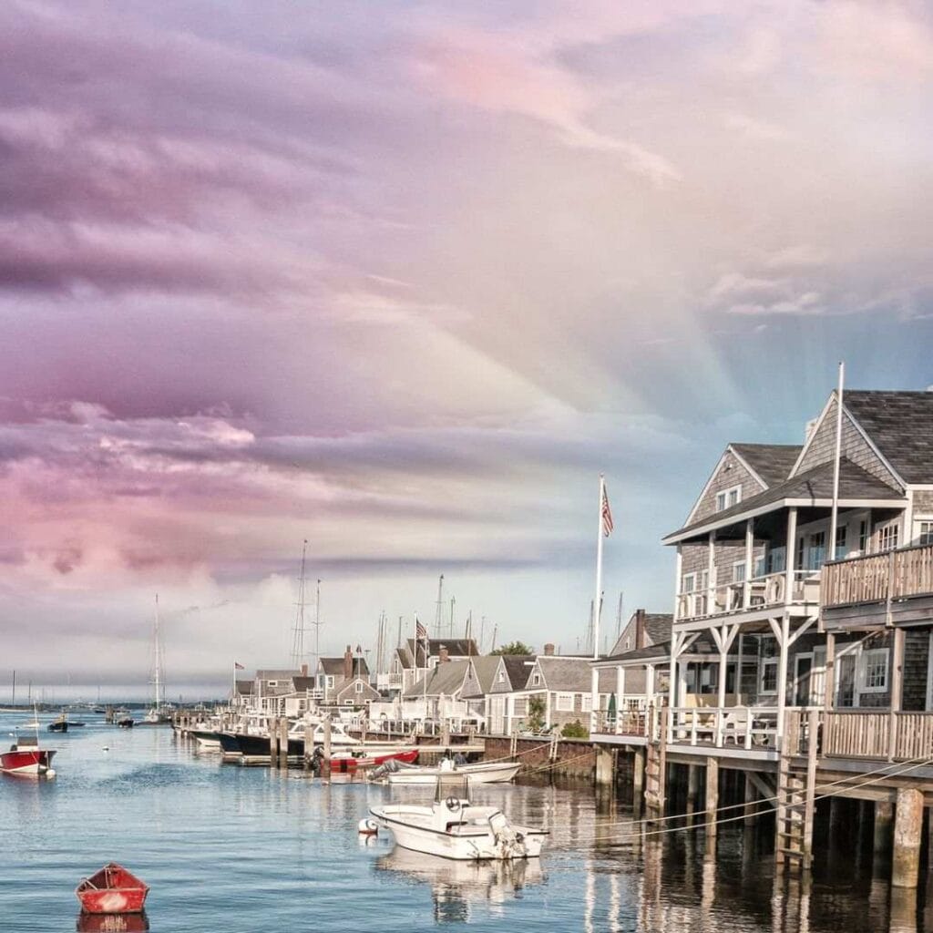 Houses over the ocean water in Nantucket, Massachusetts at dusk