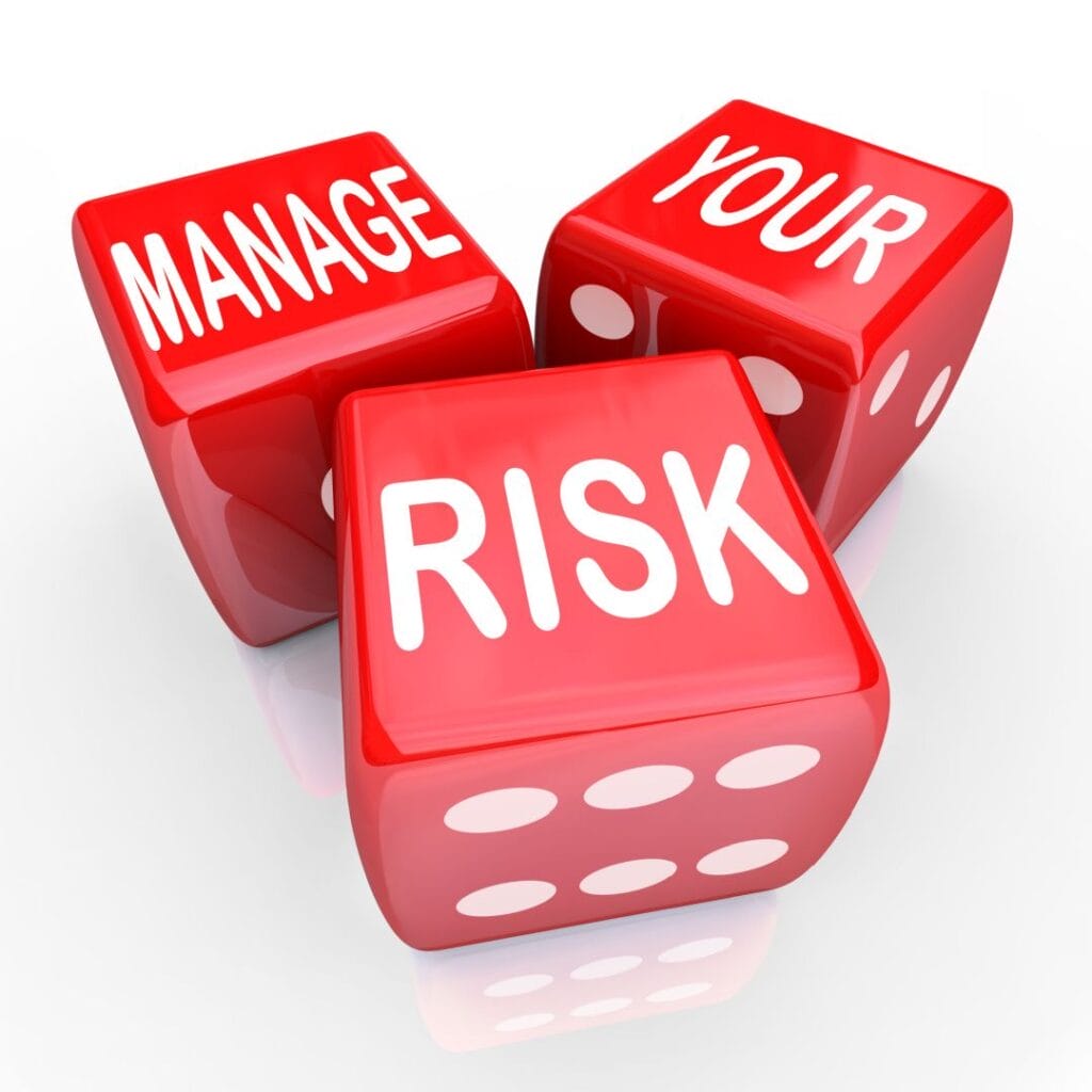 A vector of three red dice, saying “manage your risk”
