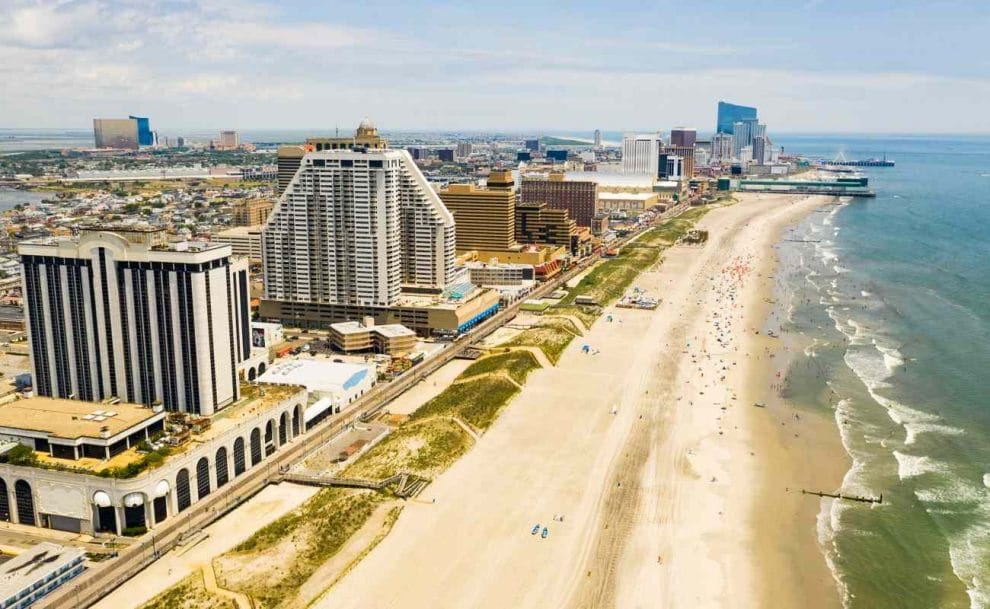 An aerial view of the Atlantic City boardwalk, city and beach.