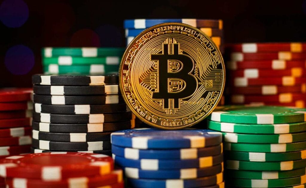 a Bitcoin on stacks of multi-colored poker chips 