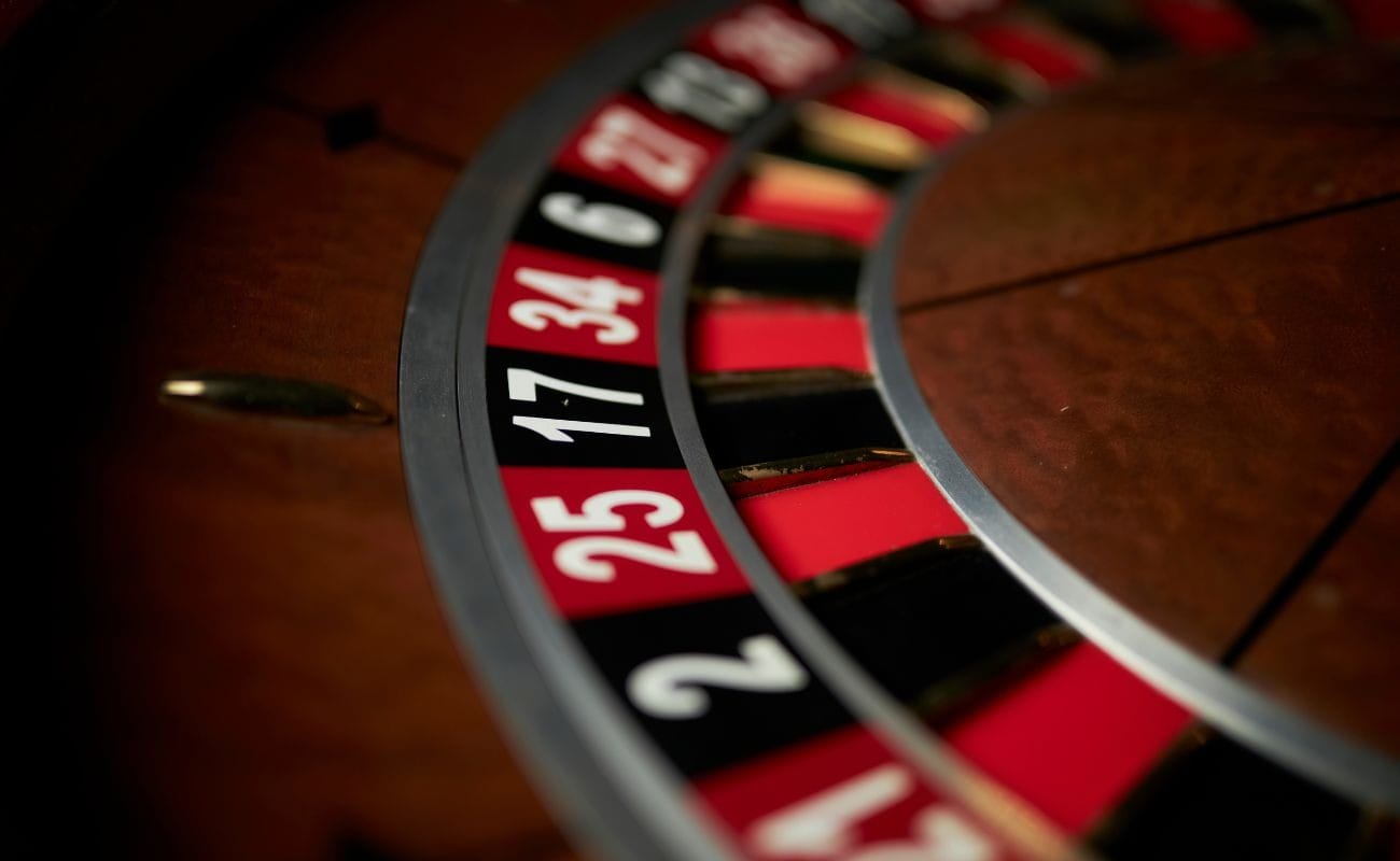 close up of the inside of a wooden roulette wheel 