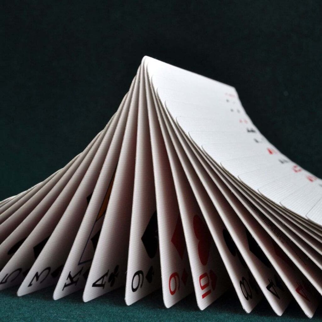 a deck of playing cards in a card flourish movement