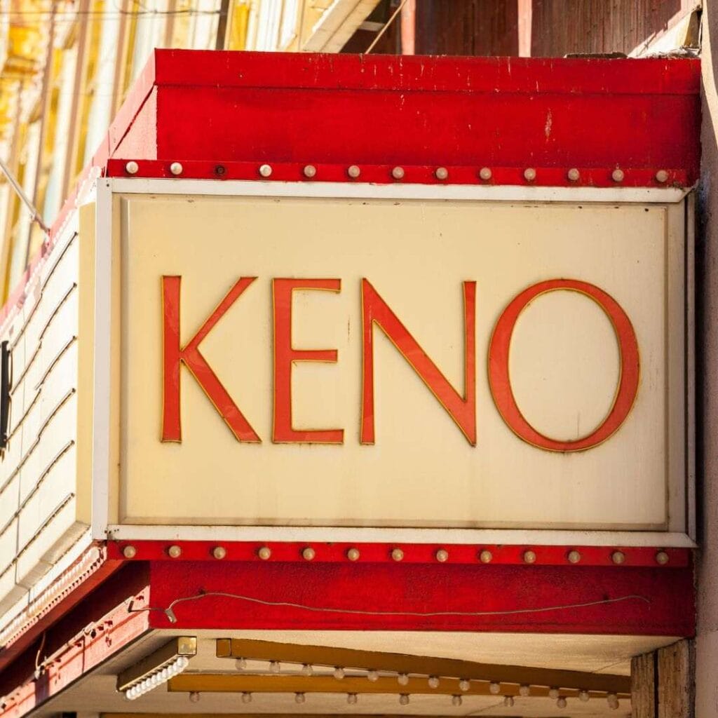 a sign on the side of a building that says “KENO”