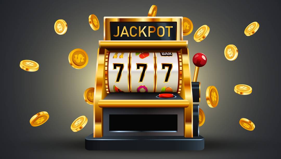 A black and gold slot machine surrounded by gold flying coins.