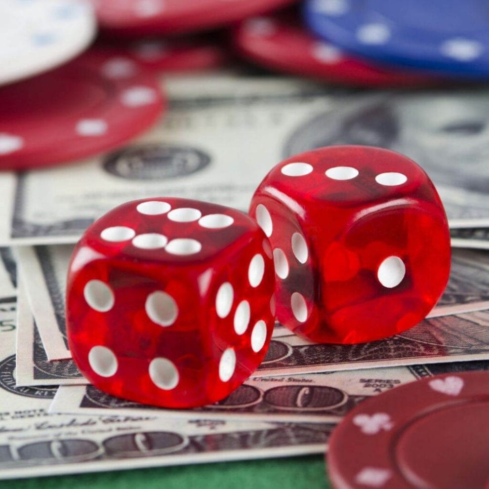 Red dice and money.