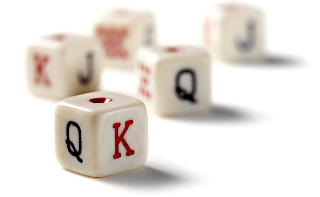 Poker dice against a white background.