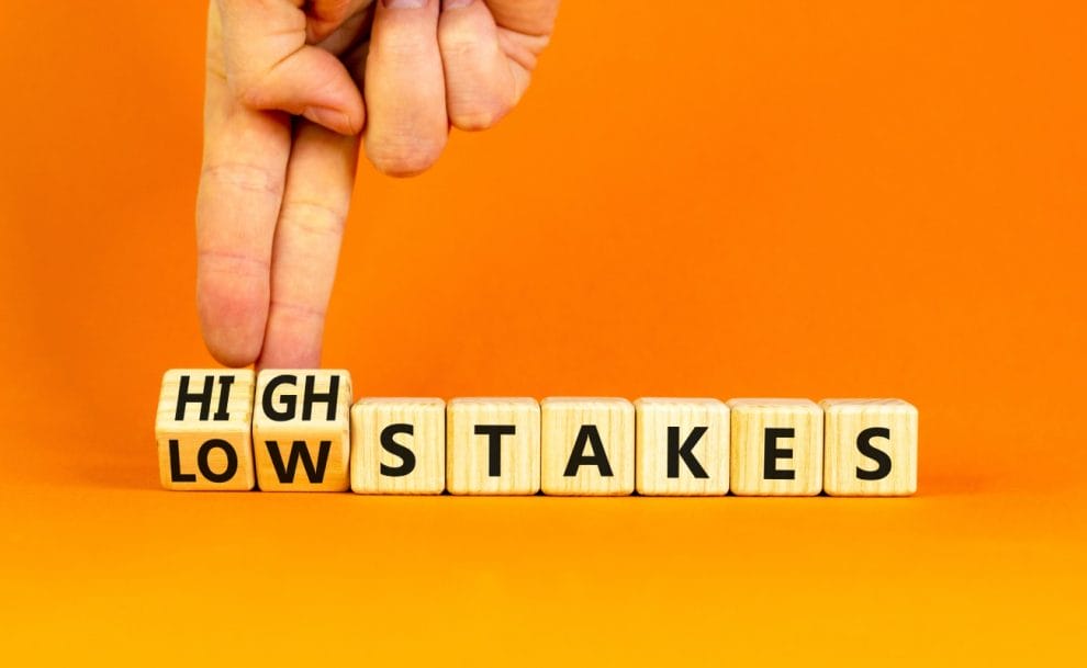 High stakes blocks on an orange background.