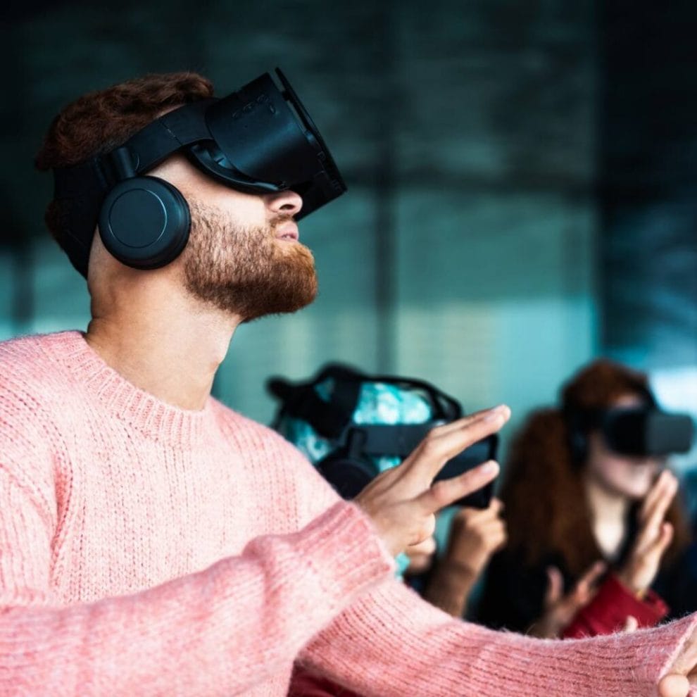 A person wearing a black VR headset.