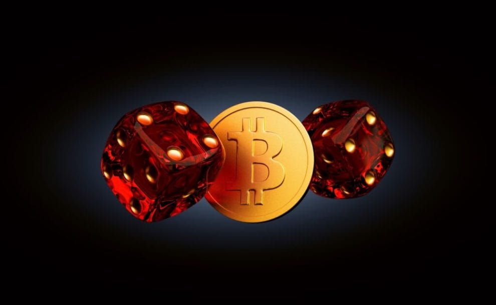 Red dice and a gold Bitcoin.