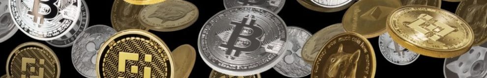 Cryptocurrency coins against a black background.