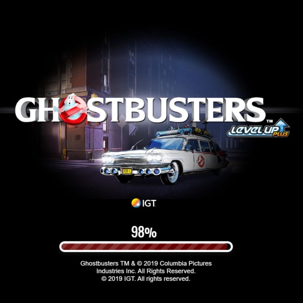 The loading screen for the Ghostbusters Triple Slime online slot game.