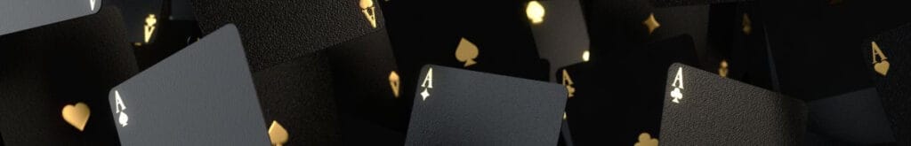 Floating black and gold Ace playing cards in all four suits on a black background.