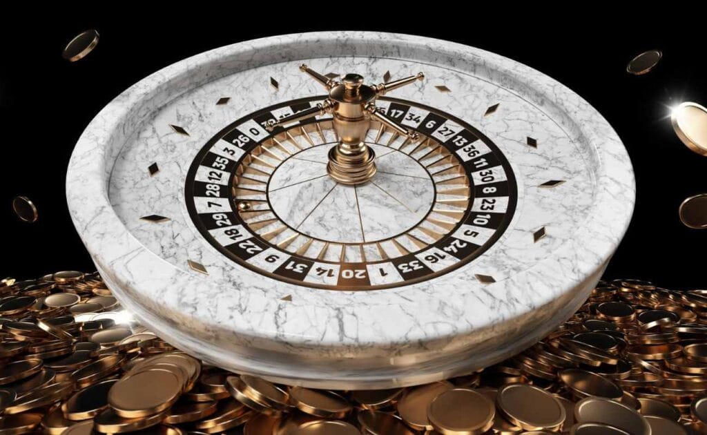 A white marble roulette wheel on a pile of gold coins. 