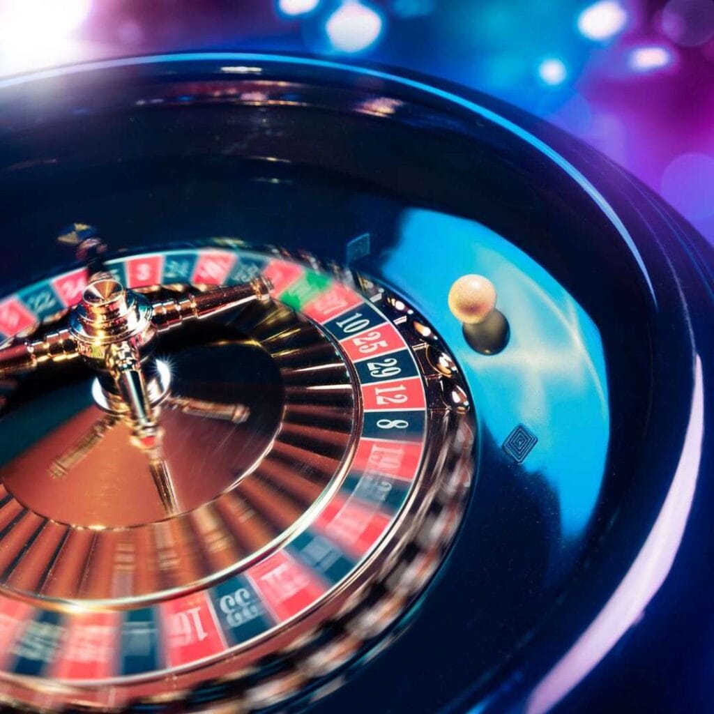 a little white roulette ball inside a spinning roulette wheel