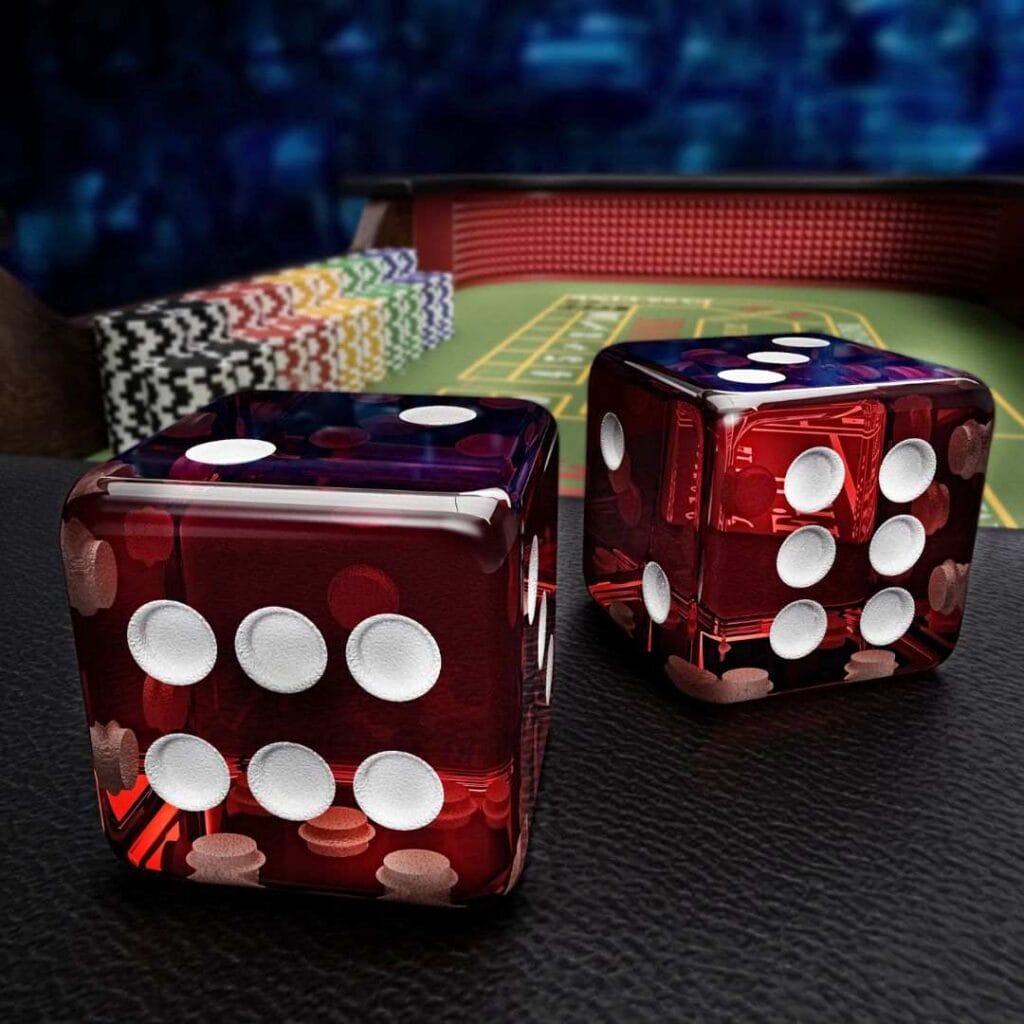 A close up of two red dice on a craps table.