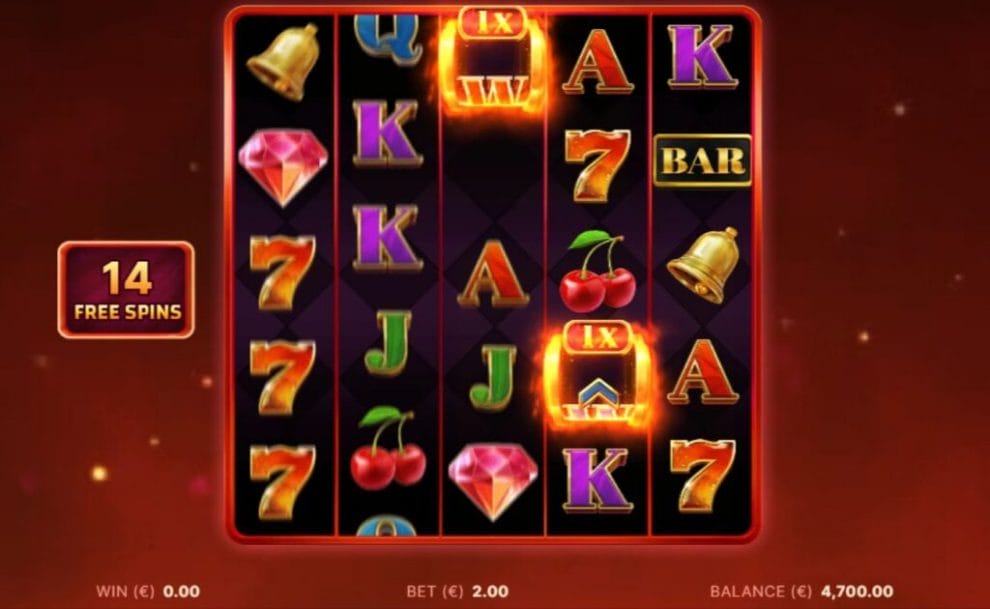 A screenshot of the slot reels on the the Let It Burn online slot by NetEnt with 14 free spins.