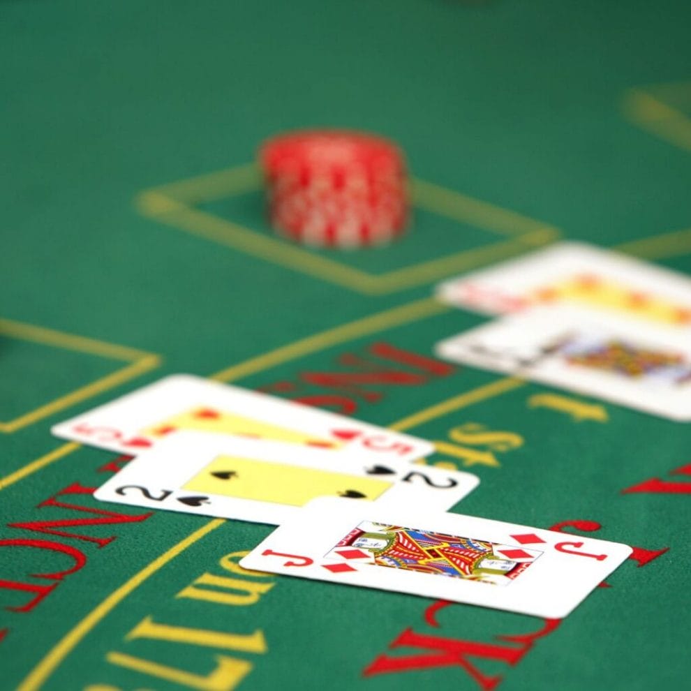 Playing cards on a blackjack table.
