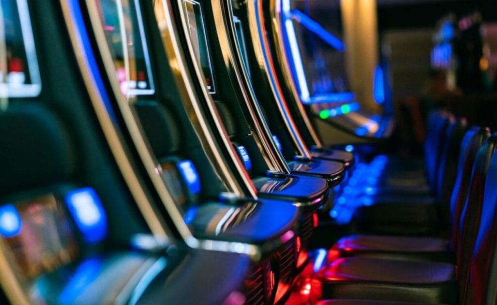 A row of slot machines in a casino.
