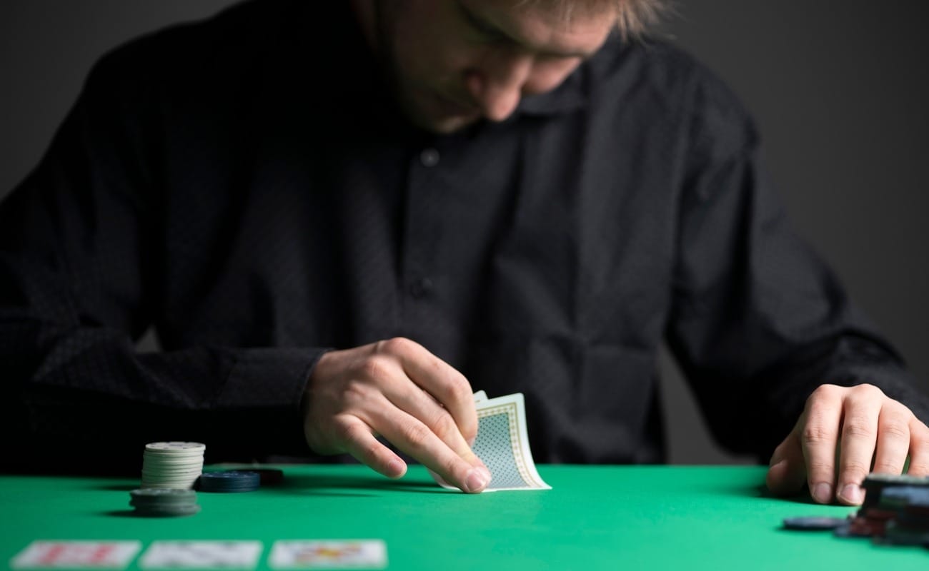 A man plays poker