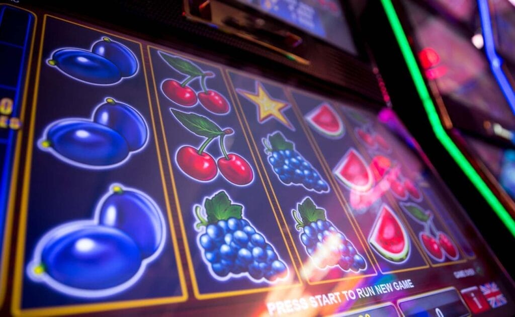 Close-up of a fruit-themed slot game.