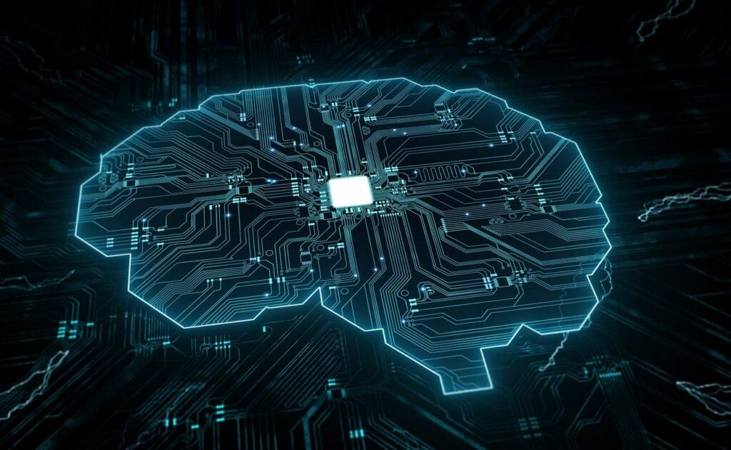 Computer circuitry in the shape of a brain, with a computer chip in the center.