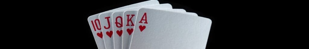 A royal flush against a black background.