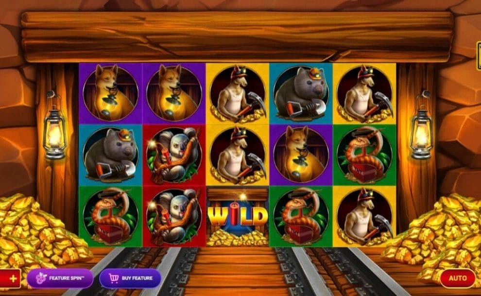 Outback Riches slot reel with various Australian animals with mining equipment.
