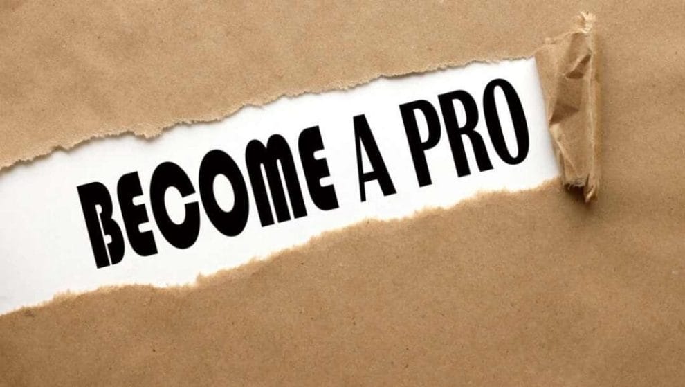 A ripped piece of brown paper revealing the words “Become a Pro.”