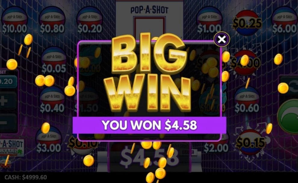 The Pop-a-Shot screen where the player has landed a big win. There are various basketballs with cash values and the Pop-a-Shot machine in the background.