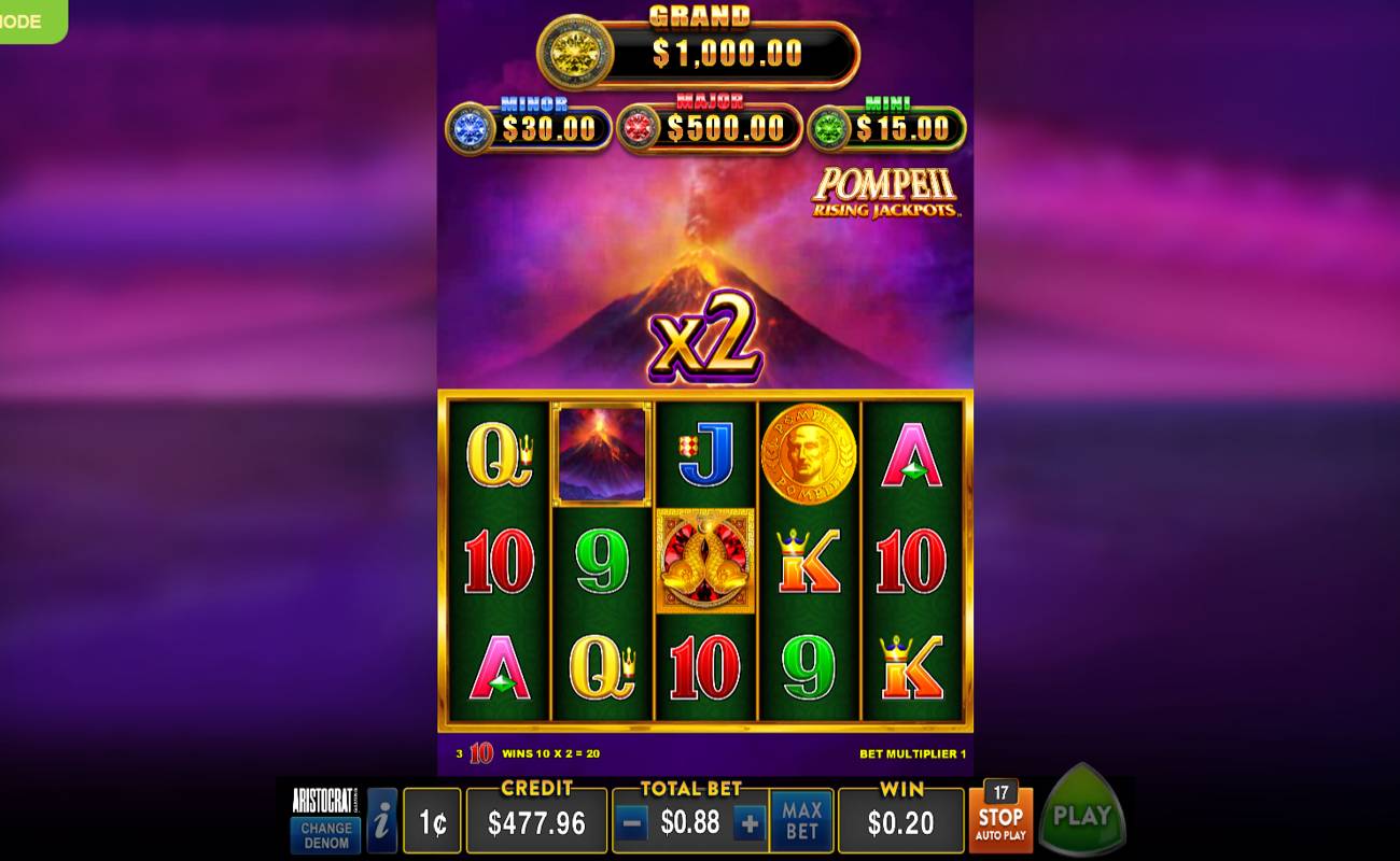 The reels in Pompeii Rising Jackpots, with a background consisting of an ocean covered in a purple haze with clouds above it. The reels contain various symbols, including the wild, scatter, A, K, Q, and J. Above the reels is a 2x multiplier and the four jackpot prizes.