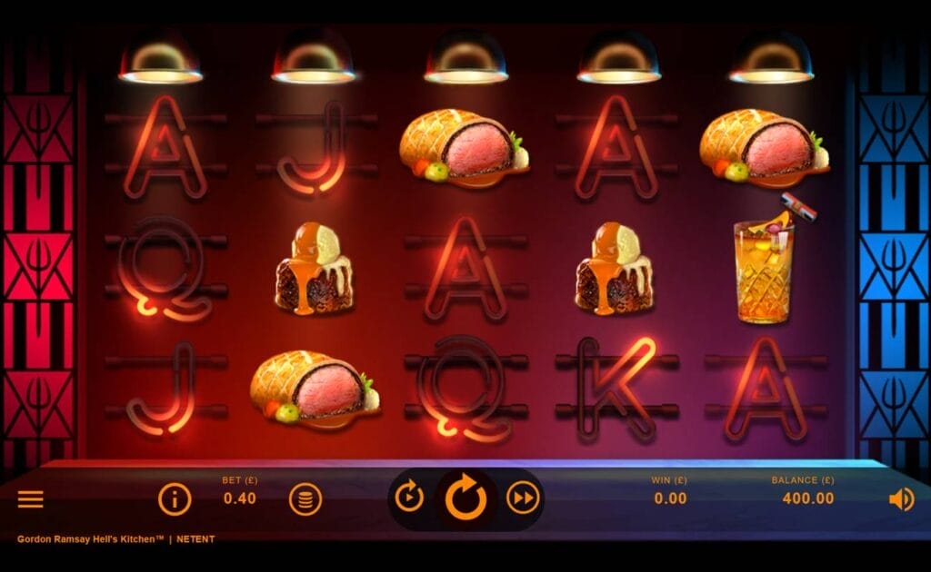 A screenshot of the reels in Gordon Ramsay Hell’s Kitchen. The reels are set between two red and blue stained glass windows with pitchfork designs. The reels contain a variety of symbols, including foods like roast pork, ice cream and brownies, cocktails, and standard symbols like an A, K, Q, and J. Bar lights shine above each reel.