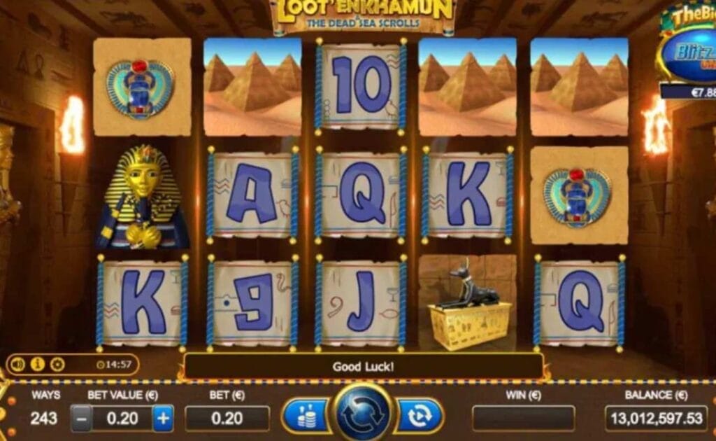 Loot’EnKhamun and the Dead Sea Scrolls online slot game with pyramids, the Sphinx and playing cards on the reels.