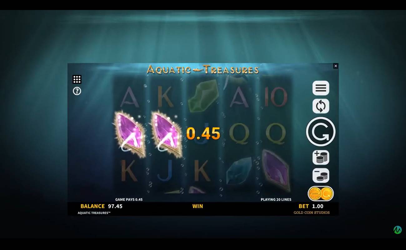A screenshot of a small win in Aquatic Treasures. The background is a dark ocean with light piercing the surface. A variety of symbols are displayed including different colored gems, as well as A, K, Q, and J symbols. Two pink gems are highlighted and a payout of 0.45 is displayed.