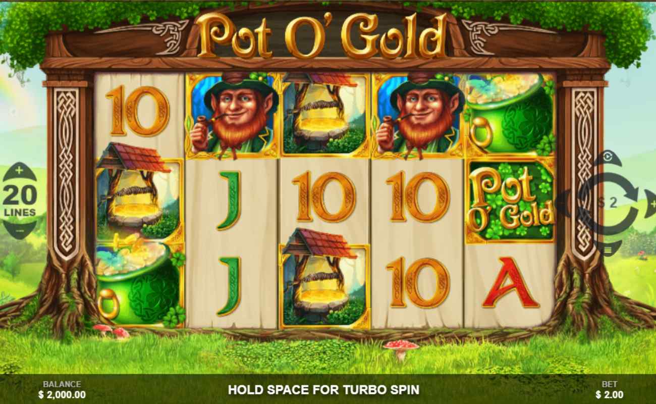 Pot O’Gold is an online slot with playing cards (10, J, and A), a green pot of gold coins, and a well with gold. The reel frames are made of trees with a carved design. There are green leaves above the reels. The background shows green countryside.