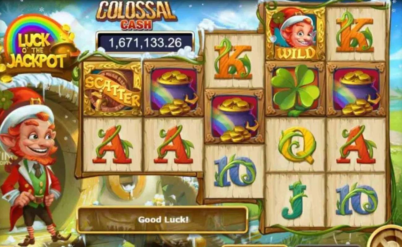 A screenshot of the reels in Luck O’ the Jackpot. The game is set outside of a leprechaun’s home, which is scattered with snow. A leprechaun stands to the left of the game’s unique slot reels. The reels have a 2-2-3-4-4 format and feature symbols like pots of gold, four-leaf clovers, a keg, and the leprechaun himself. The reel also contains the standard slot symbols A, K, Q, and J.