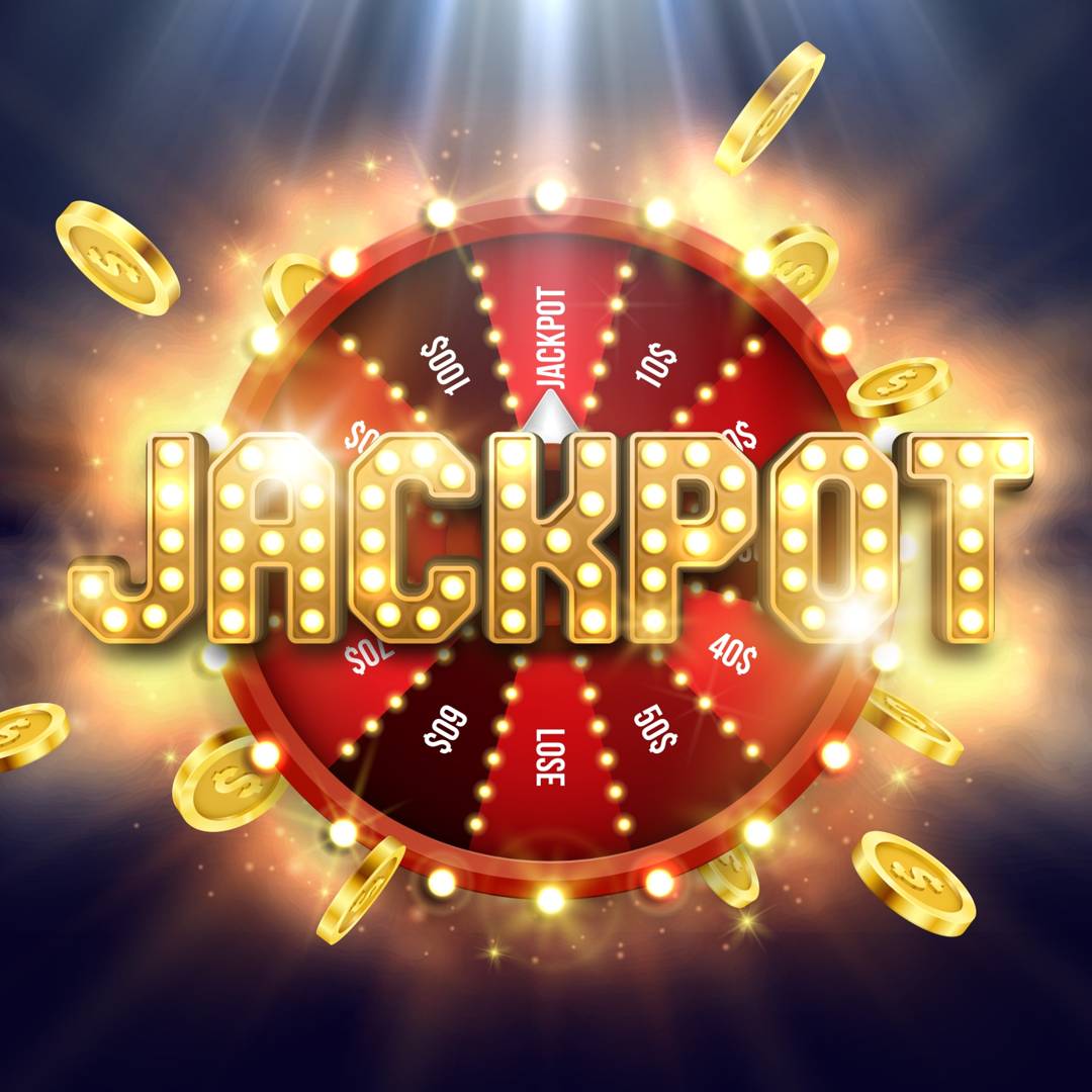 The word “jackpot” in bright lights in front of a red lottery wheel.