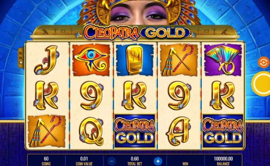 A screenshot of the gameplay of Cleopatra Gold, various Egyptian-themed slot symbols fill a5x3 slot grid with Cleopatra looking over the top and a blue, brick archway in the background.