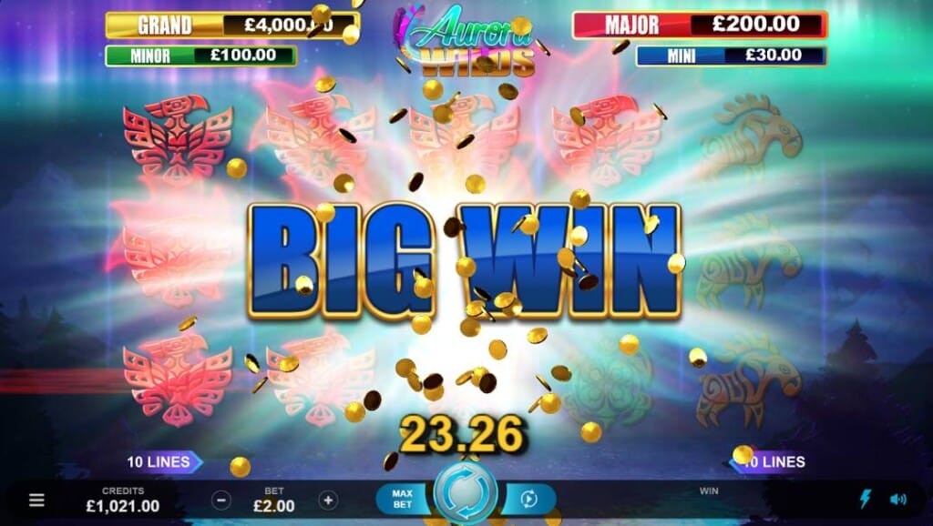 A screenshot of a big win in Aurora Wilds. The screen is filled with light as coins fly forward with the words BIG WIN and the prize value on the screen in front of the slot reels and jackpot prizes.
