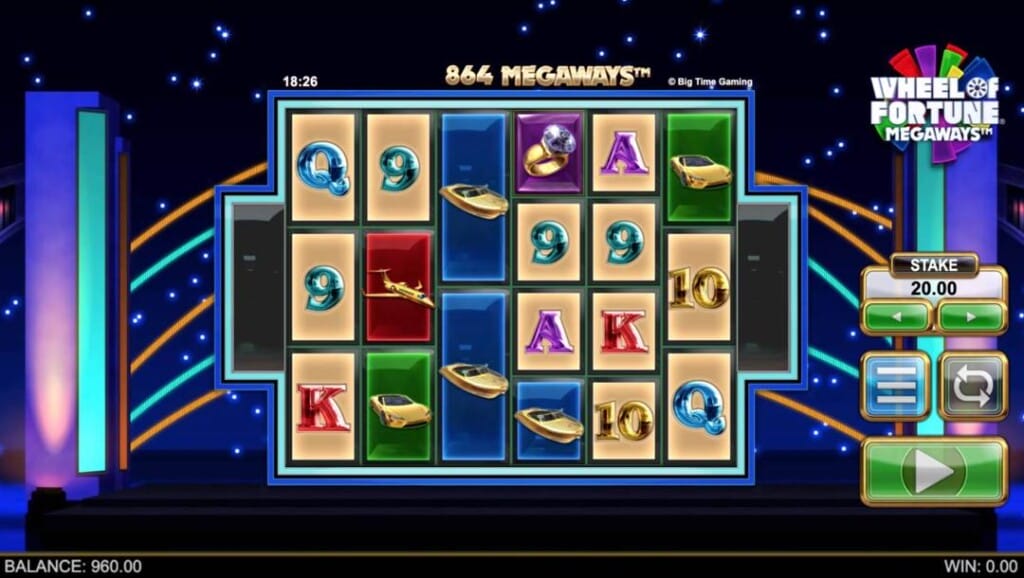 A screenshot of the slot reels in Wheel of Fortune Megaways. The background is a game-show-like set with a starry night sky, two colored columns, and beams of orange and blue light connecting them. In the foreground are the game’s slot reels. The reels are filled with game show and playing card symbols.