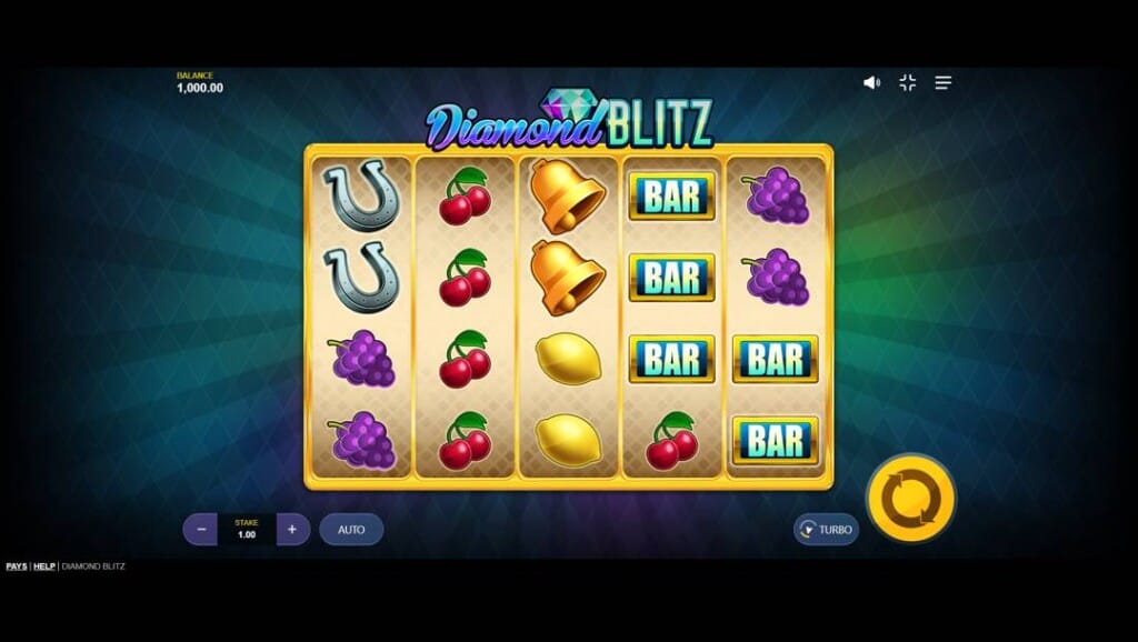 A screenshot of the slot reels in Diamond Blitz. The background features beams of light against a diamond-design background with shades of green and blue. In the foreground are simple golden slot reels with various classic slot symbols, including cherries, grapes, and BAR symbols.