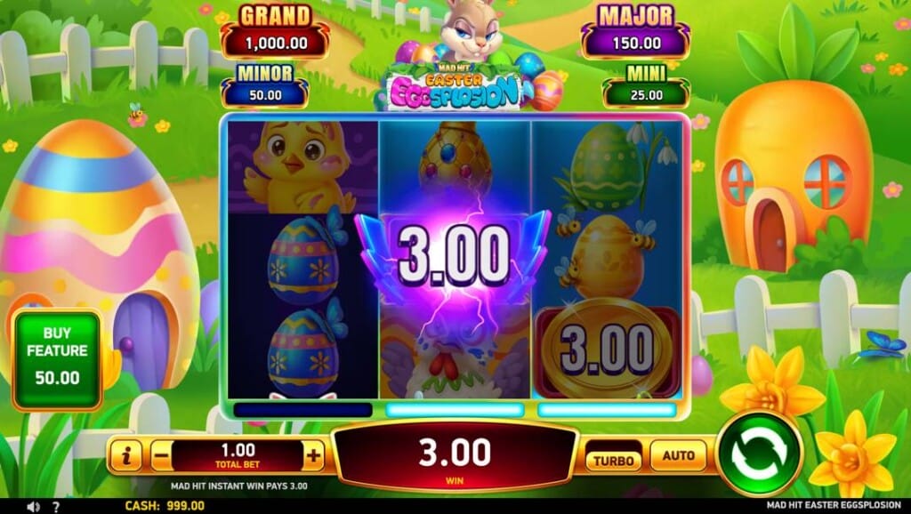 A screenshot of the Mad Hit Easter Eggsplosion slot. The game is set against a cute cartoon village with egg and carrot houses. In the foreground are the slot reels filled with Easter-themed symbols and a gold coin with a  3.00 value on it. In the center reels is a bright light with a wing-like blue and purple design and a cash value of 3.00. The four jackpot prizes are listed above the reels.