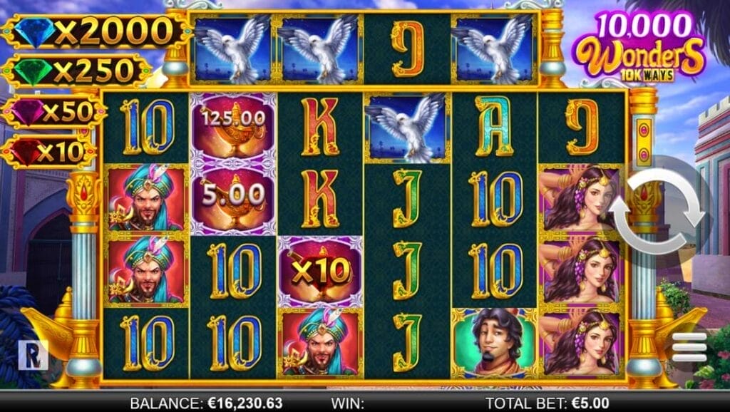 A screenshot of the slot reels in 10,000 Wonders 10K Ways. The setting is a rich Middle Eastern palace exterior. In the foreground are the slot reels with two gold and silver columns on either side. The reels are filled with Arabian Nights and playing card-themed slot symbols. The jackpot prizes are visible to the left of the reels.