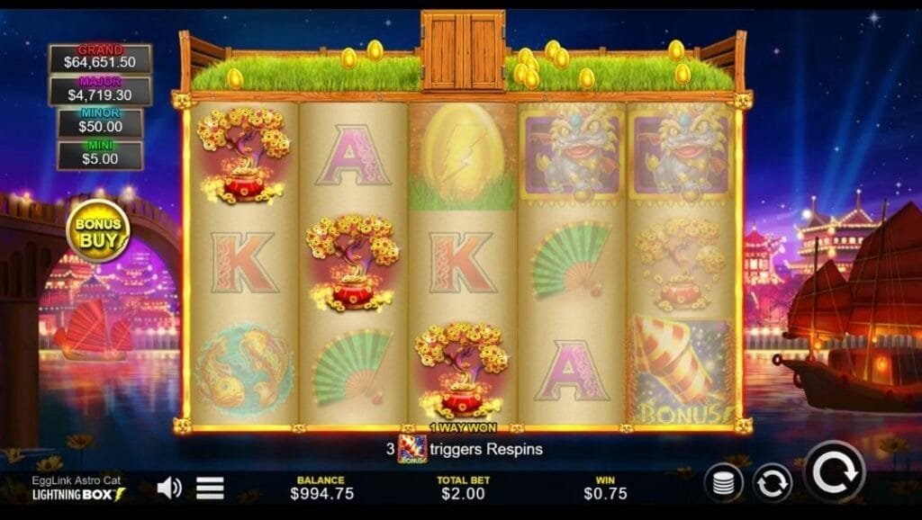 The EggLink Astro Cat gameplay screen highlighting a win with multiple coin pot symbols landing across the reels. Jackpot tiers remain visible on the left and updated balance and win amount appear along the bottom panel.