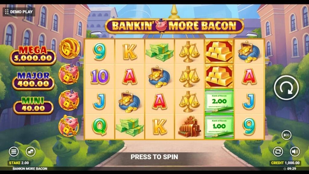 Bankin’ More Bacon slot interface with a 6-reel layout, card symbols, cash icons, and other feature symbols set against a luxury building and garden background. The jackpot prizes are listed to the left of the slot reels.