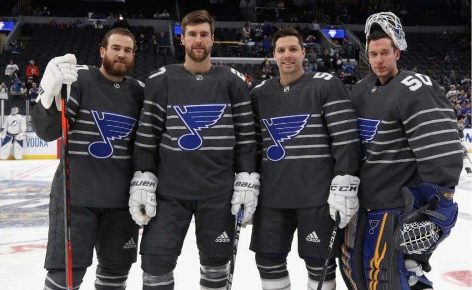 Ryan O'Reilly #90, Alex Pietrangelo #27, David Perron #57 and Jordan Binnington #50 of the St. Louis Blues pose for photos prior to the 2020 Honda NHL All-Star Game